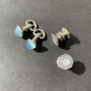 Two pairs of men's cufflinks.